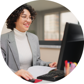 Make Payments Woman on computer